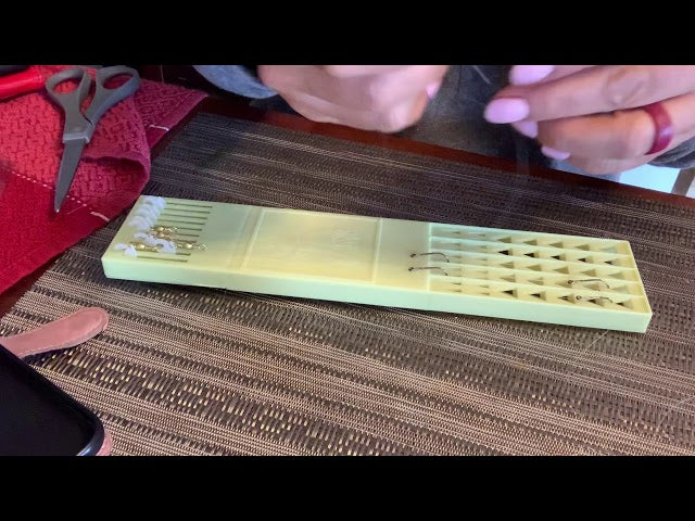 A video on how to use the eagle claw snell hook holder