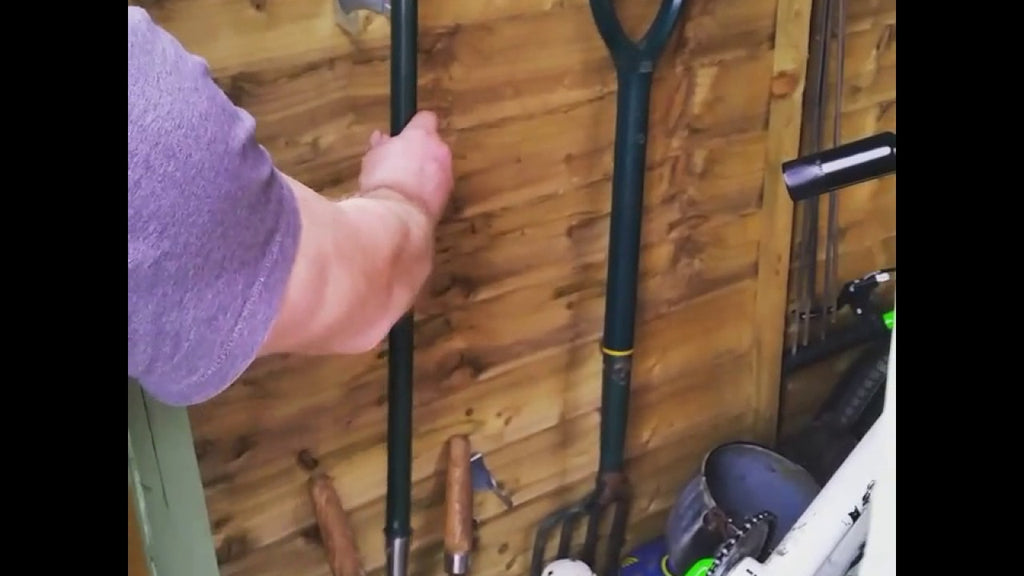 Simply hook over the overlap boards on the shed